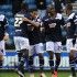 Calciatori del Milwall FC in festa dopo una rete
