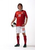 Rosicky con il nuovo completo della Puma