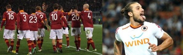 La prima divisa della Roma con calzettoni rossi e la maglia bianca con colletto giallorosso