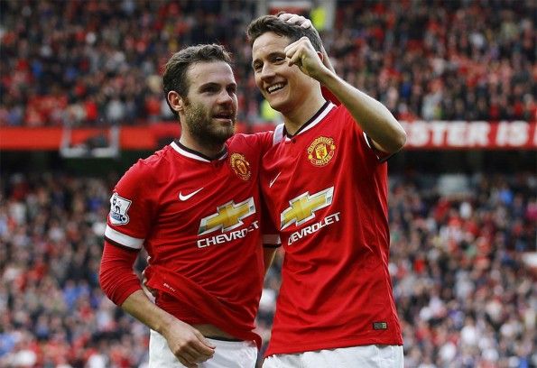 Herrera e Mata festeggiano dopo un gol