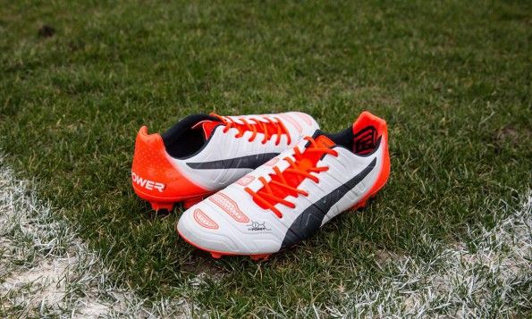 Scarpe evoPower 1.2 bianche arancioni nere