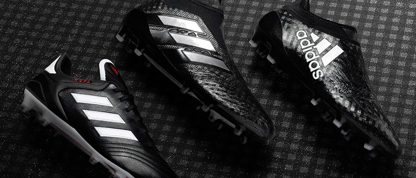 Scarpe da calcio clearance adidas bianche e nere