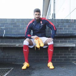 Olivier Giroud con le Puma evoPower Vigor 1 arancioni