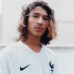 Francia grafica linee rosse e blu, maglia away